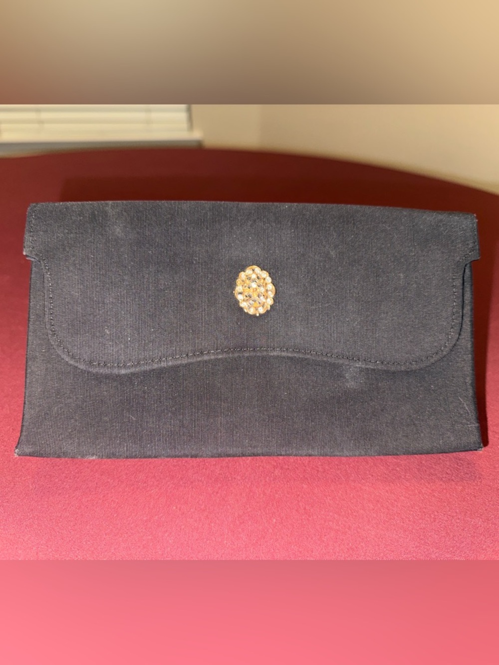 Black Evening Clutch with Gold Brooch Accent